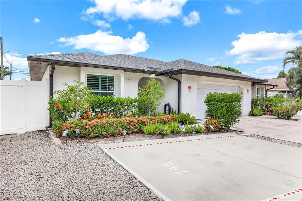 Single story home with a garage