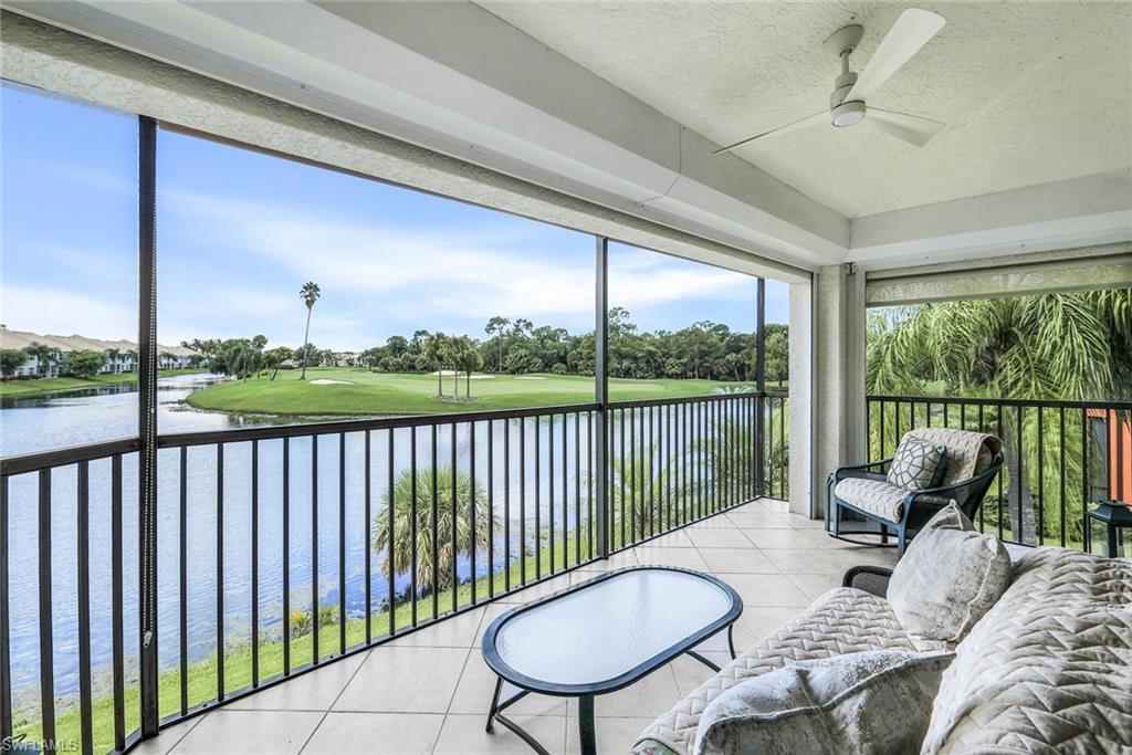 Screened Lanai featuring ceiling fan and a water and golf views.