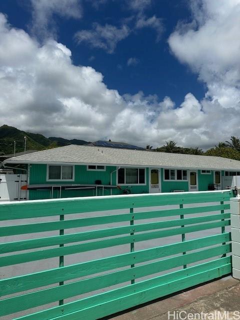 a front view of a house with a green yard