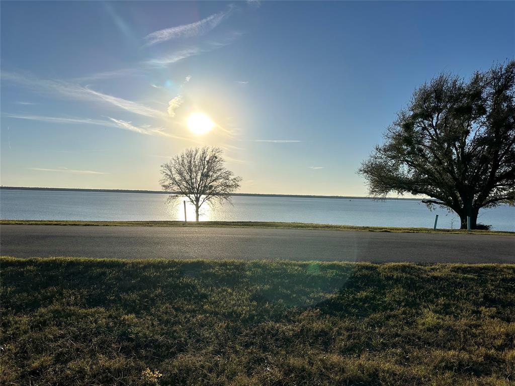 a view of an outdoor space with lake view