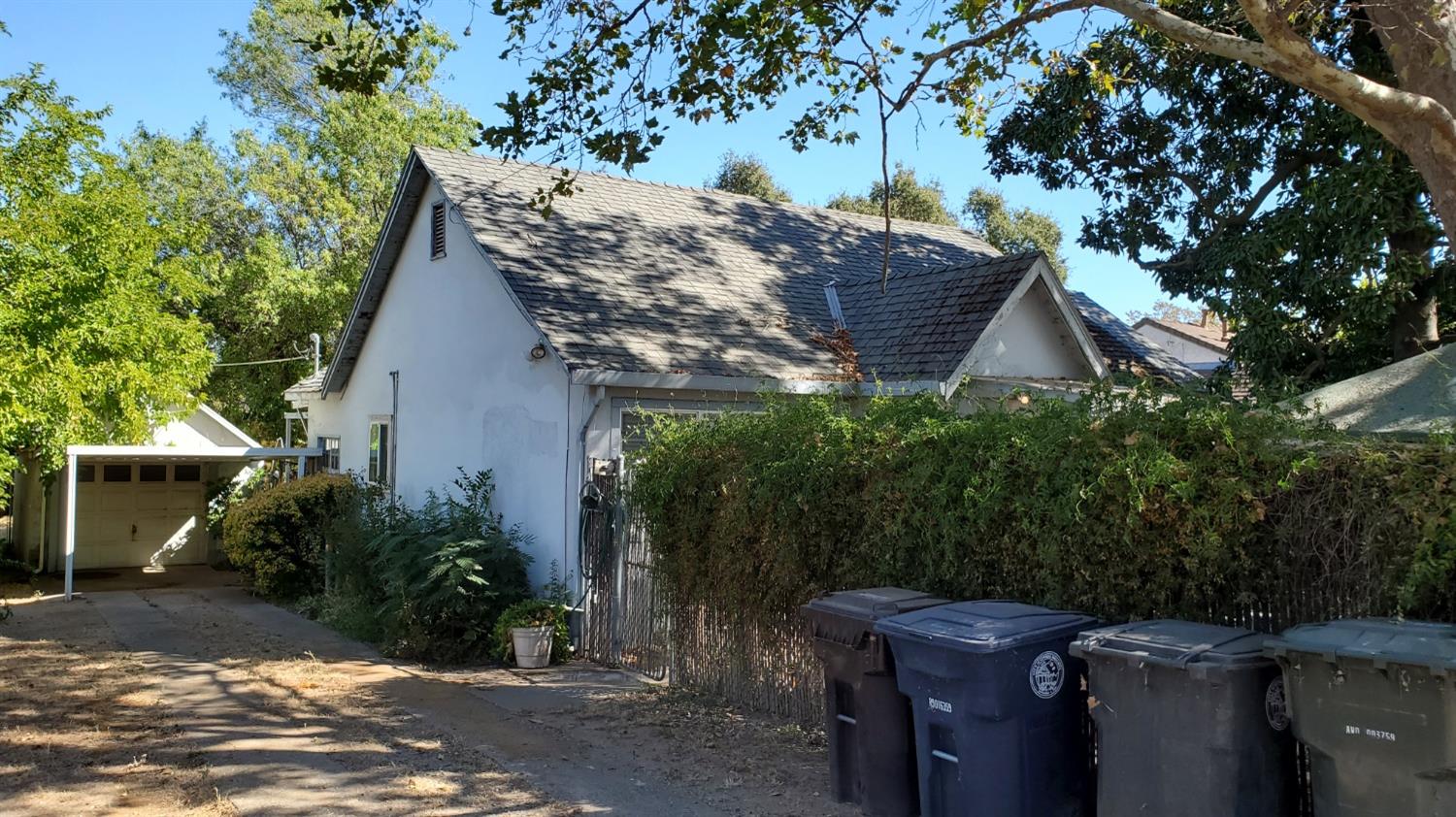 a view of a house with a tree