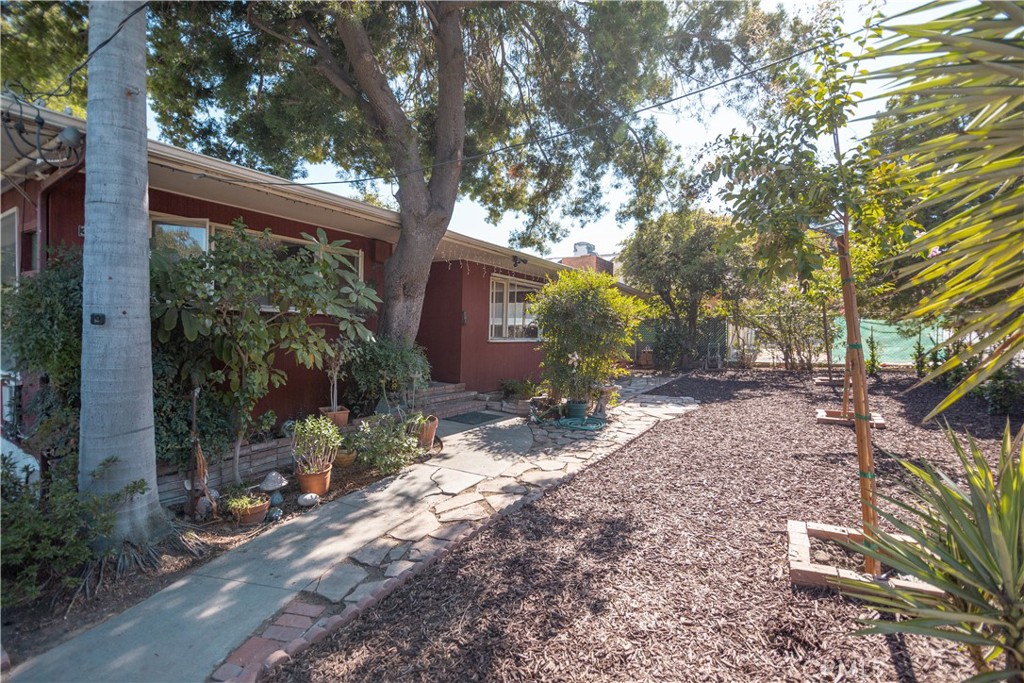 a backyard of a house with lots of green space