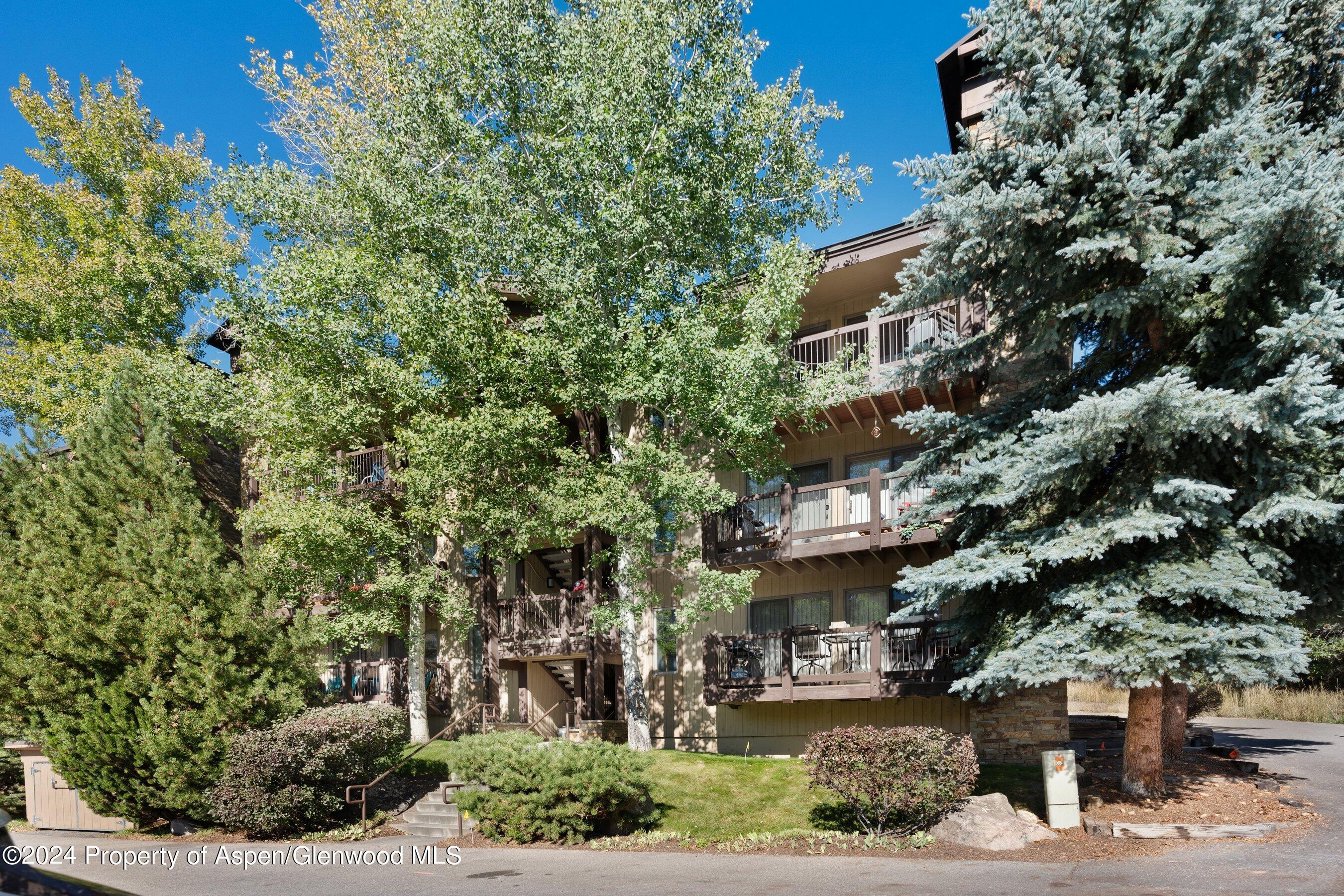 a view of a building with a garden