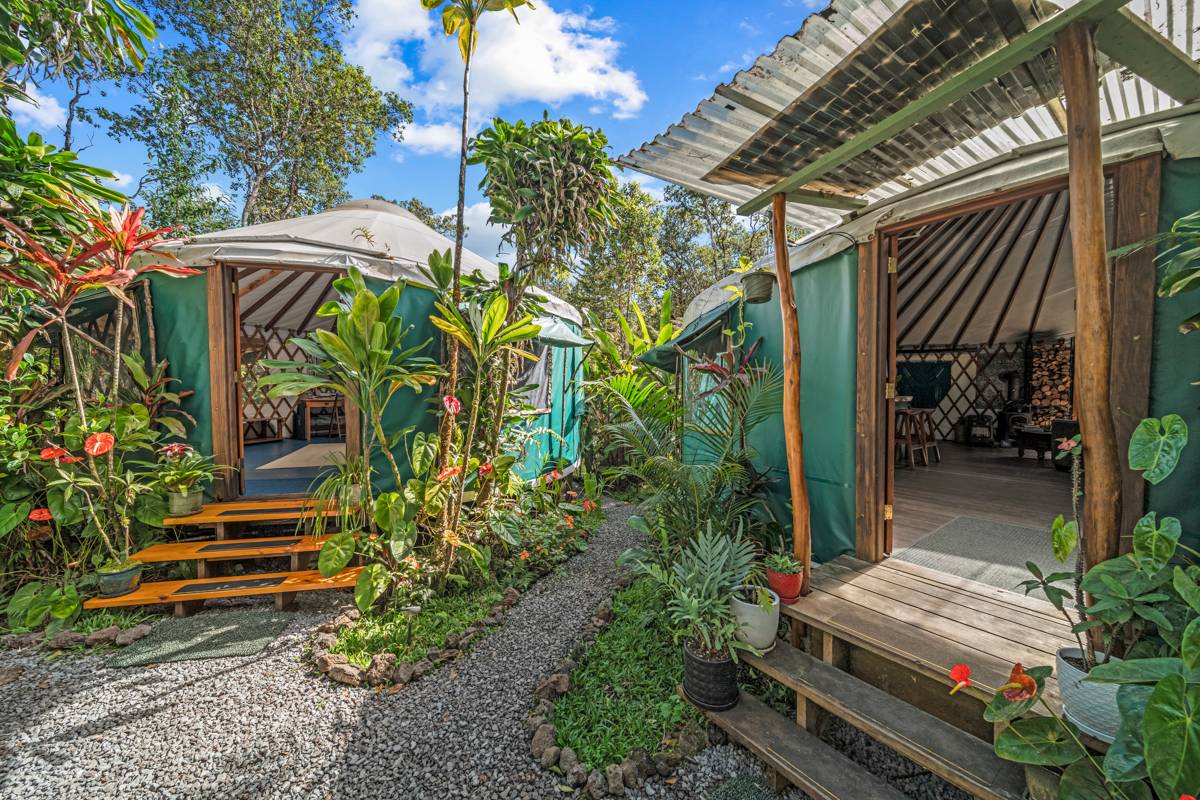 a backyard of a house with lots of green space