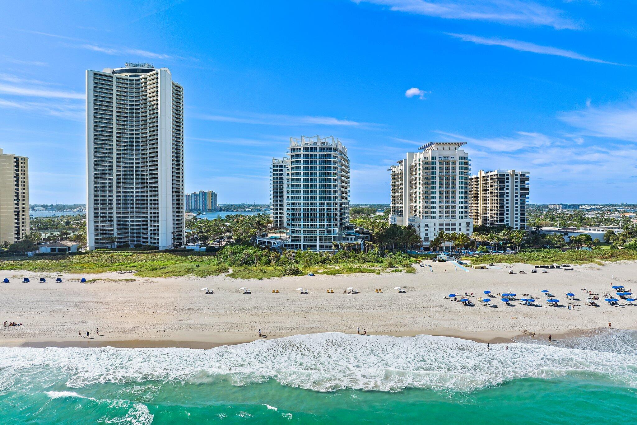 a view of a city with tall buildings