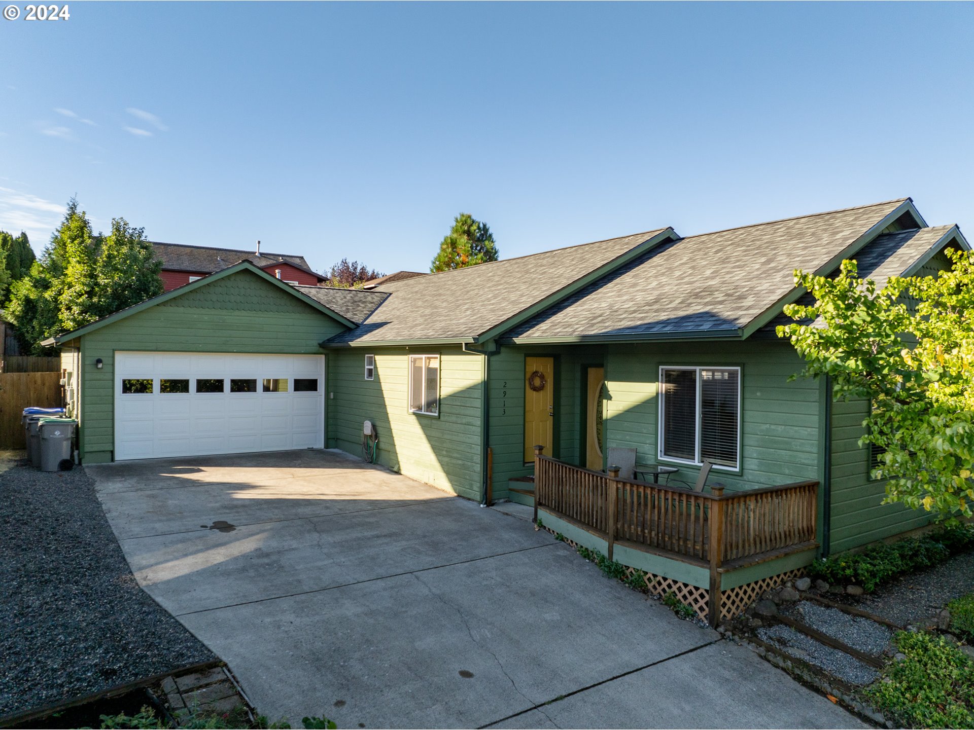 a front view of a house with a garage