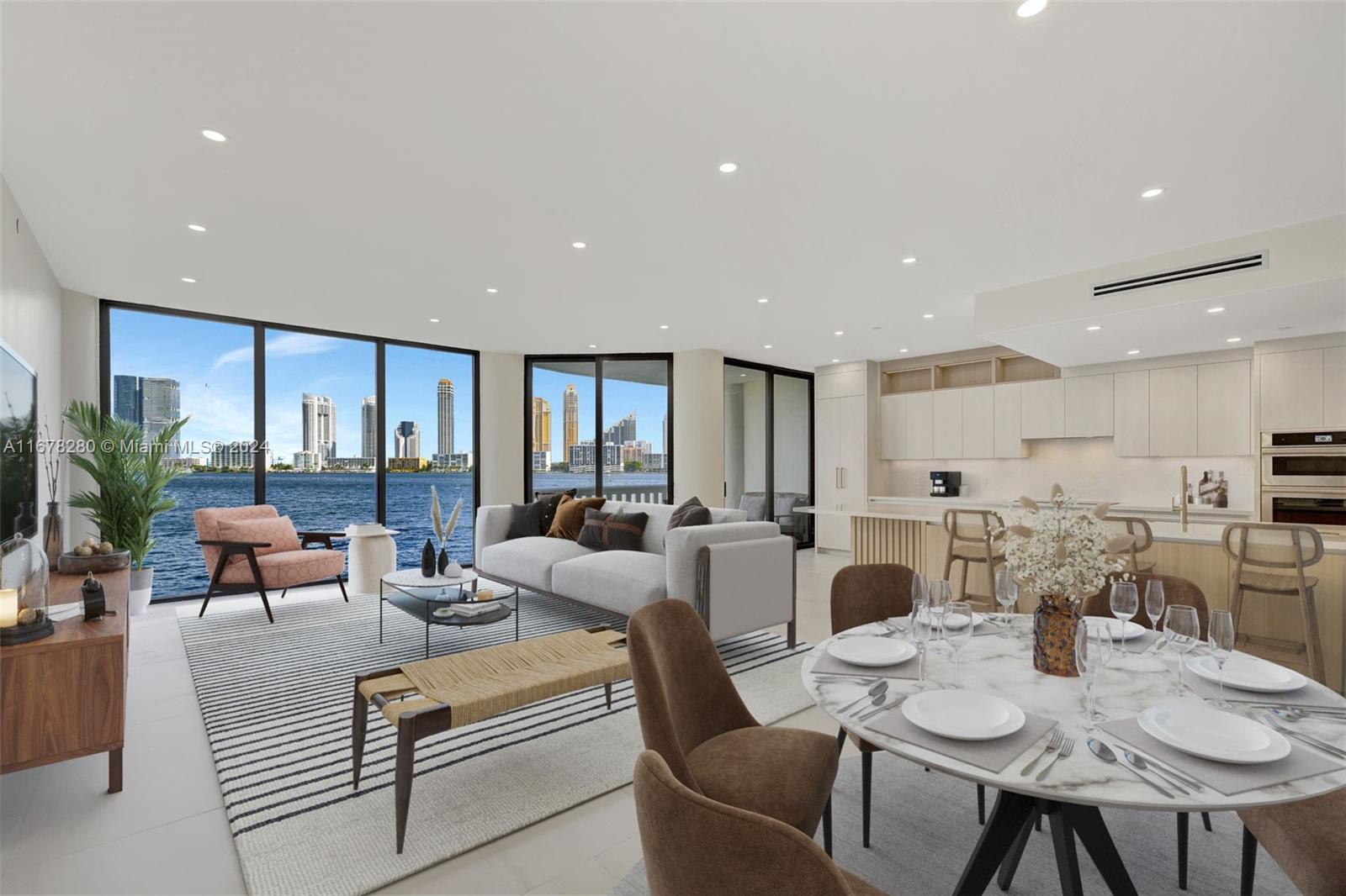 a living room with furniture kitchen view and a large window