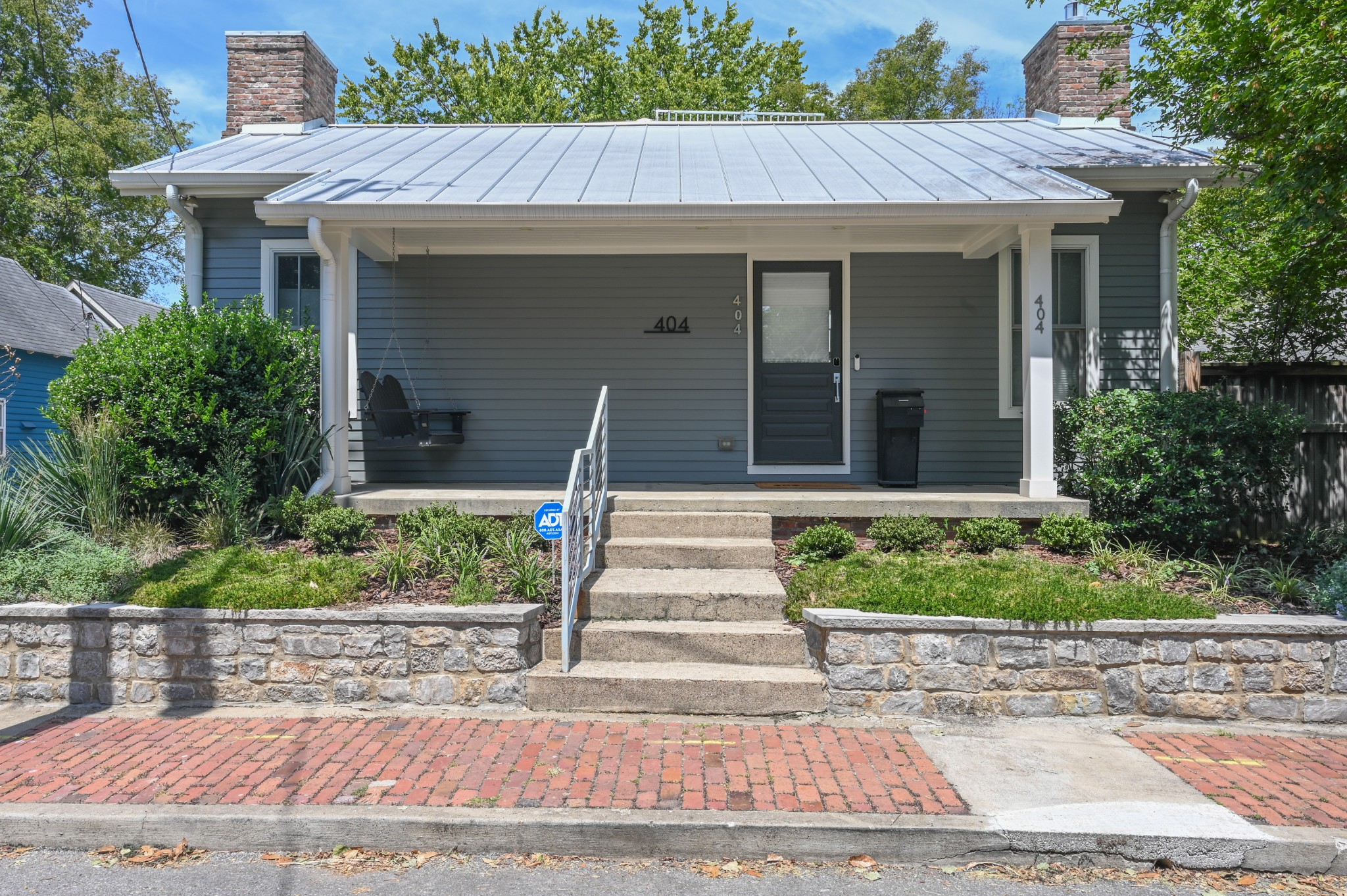 a front view of a house with a porch