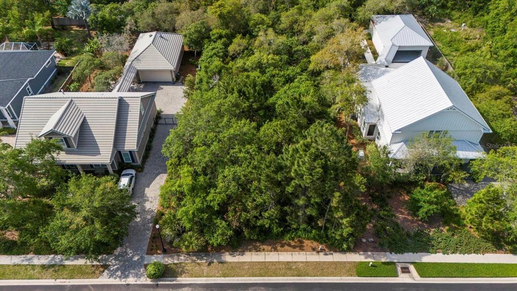 an aerial view of house with yard