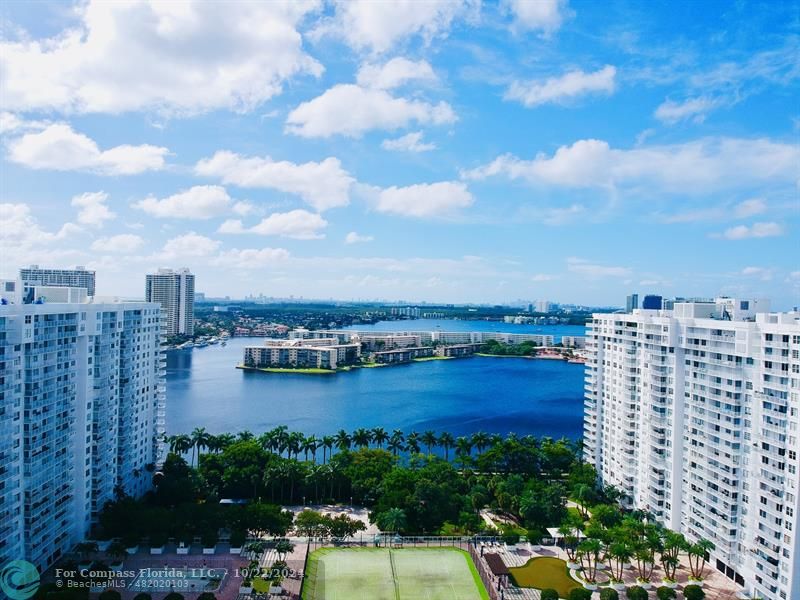 a view of a city with tall buildings