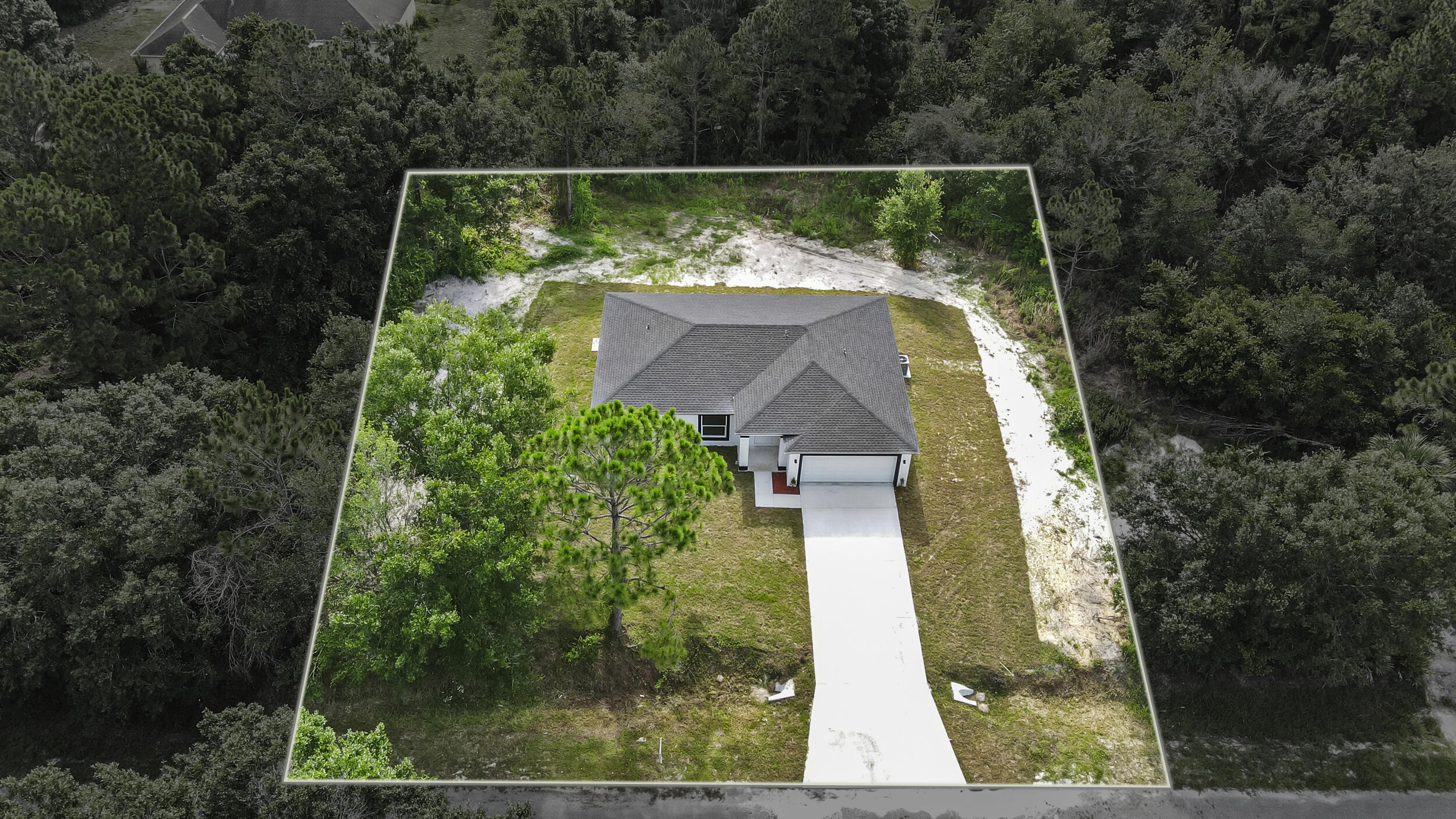 an aerial view of house with outdoor space