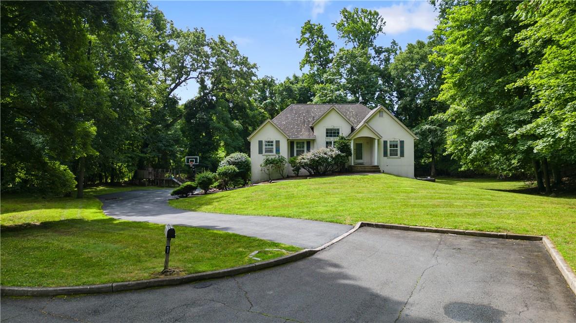 View of front of home featuring a front lawn