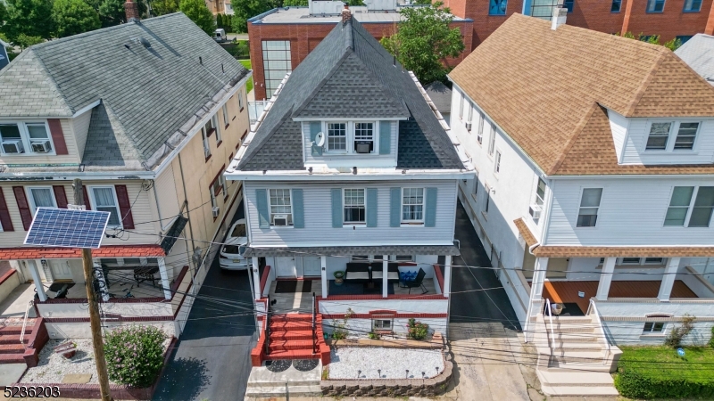 a aerial view of a house with a porch