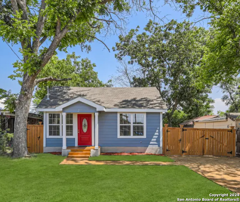 front view of a house with a yard