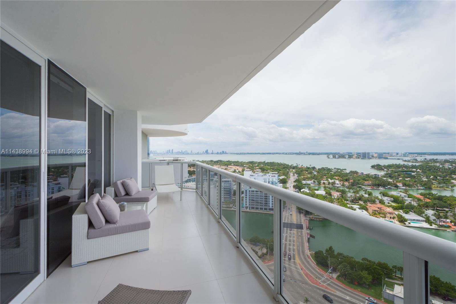 a view of balcony with furniture