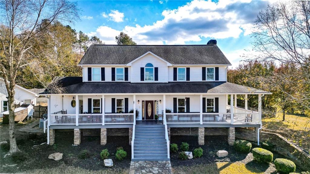 a front view of a house with a porch