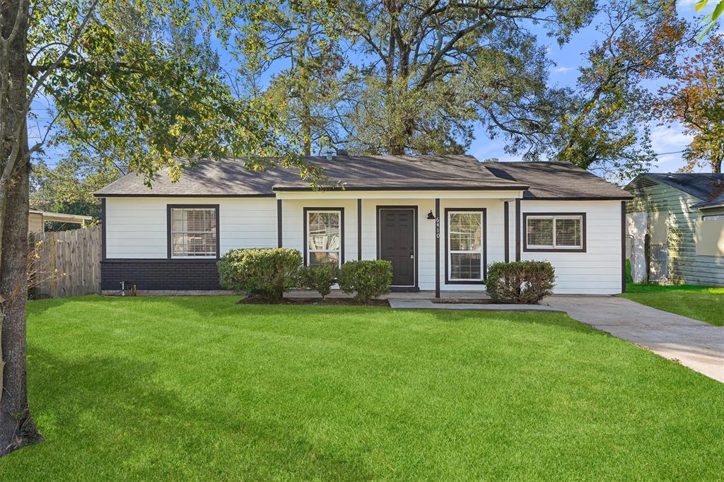 front view of a house and a yard