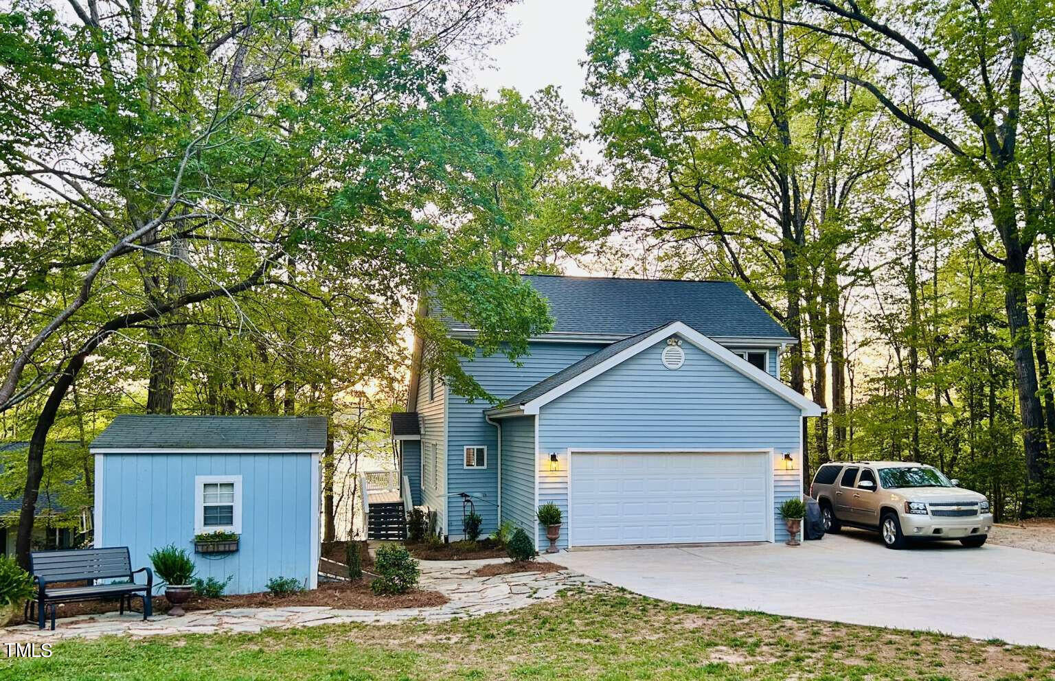 front view of a house with a yard