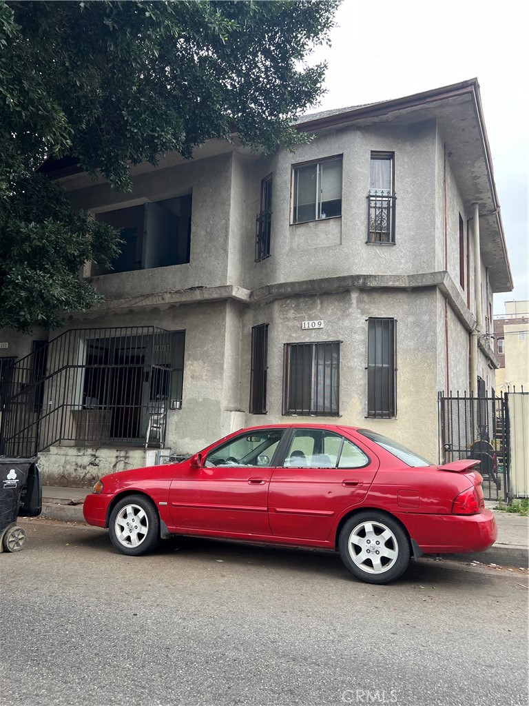 a car parked in front of a house