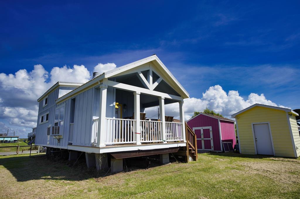 a front view of a house with yard