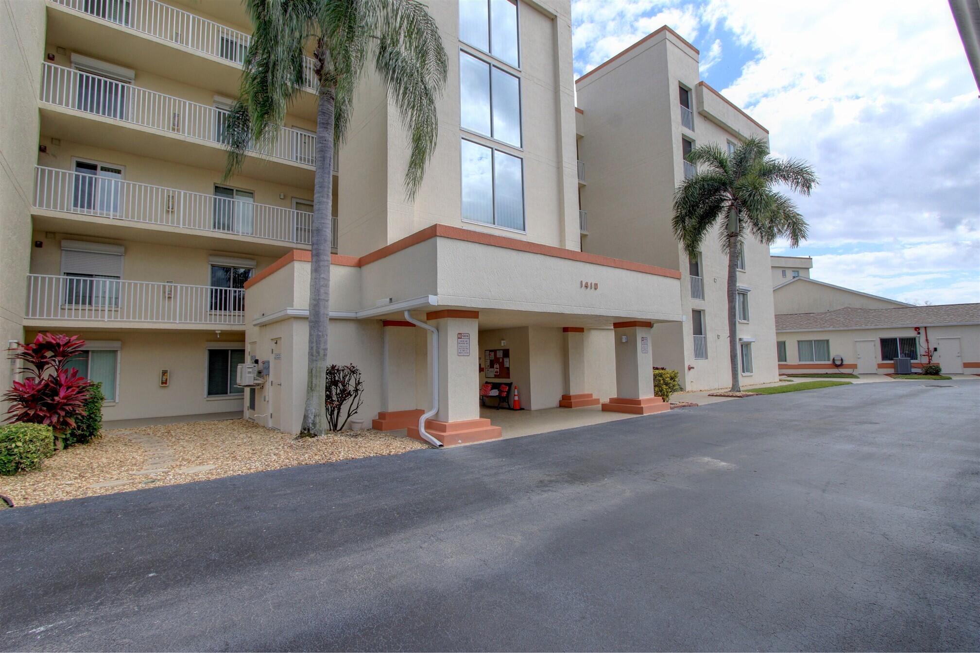 a view of a building with a street