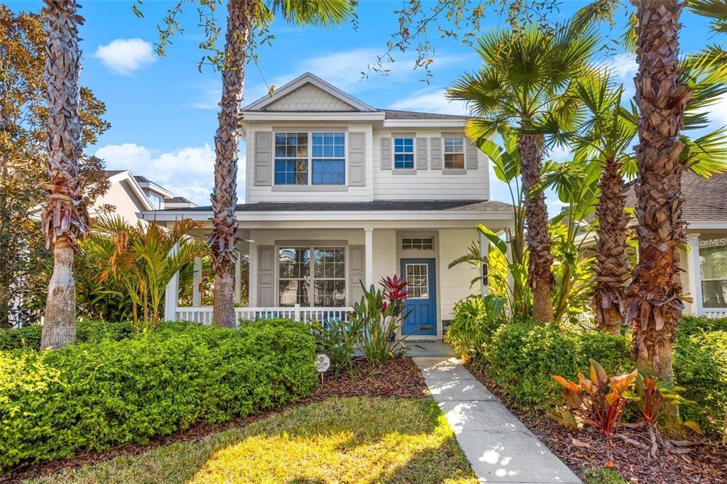 front view of a house with a yard