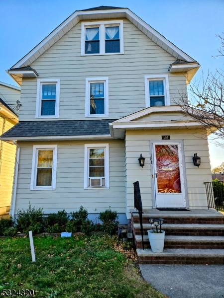 a front view of house with yard