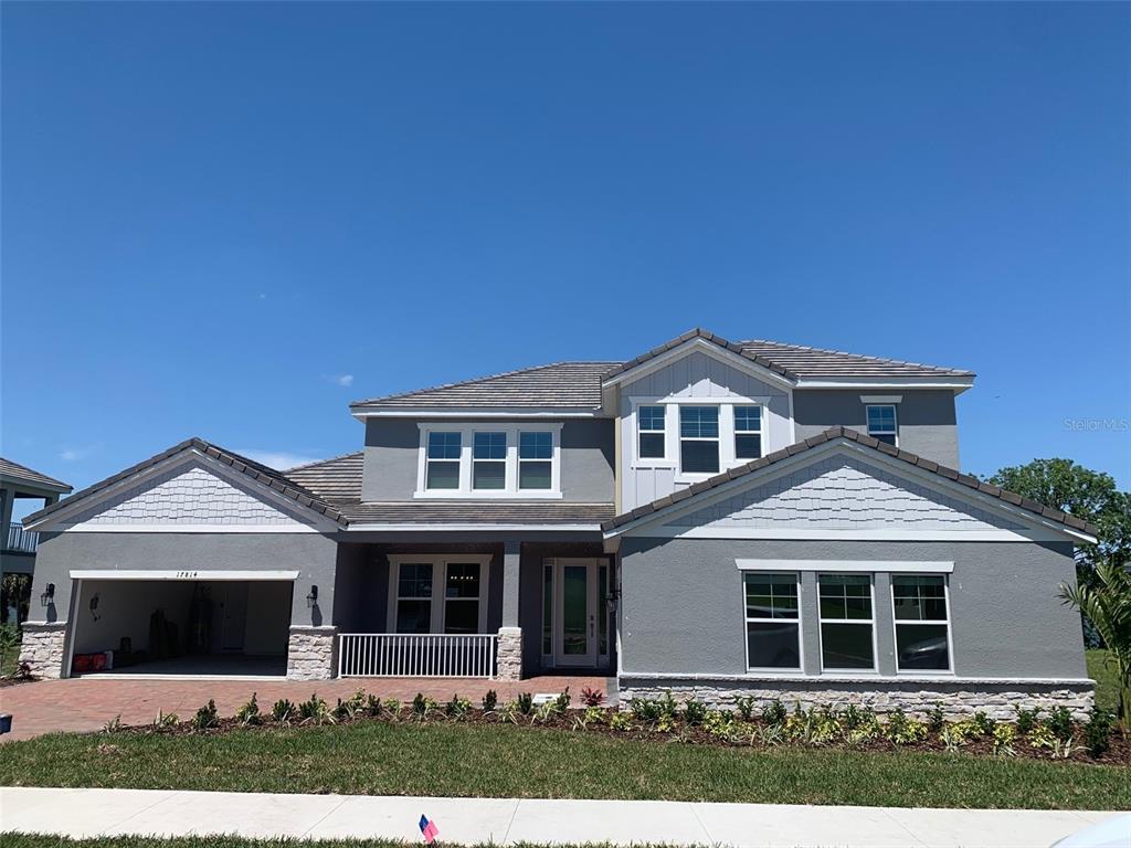 a front view of a house with yard