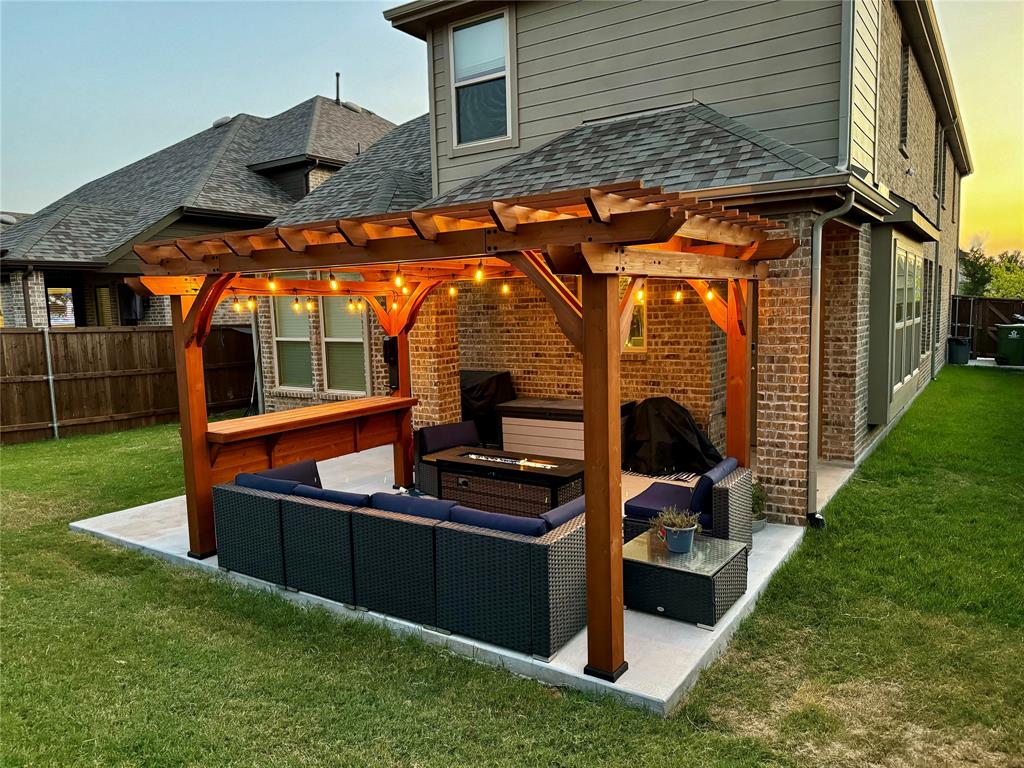 a backyard of a house with seating space