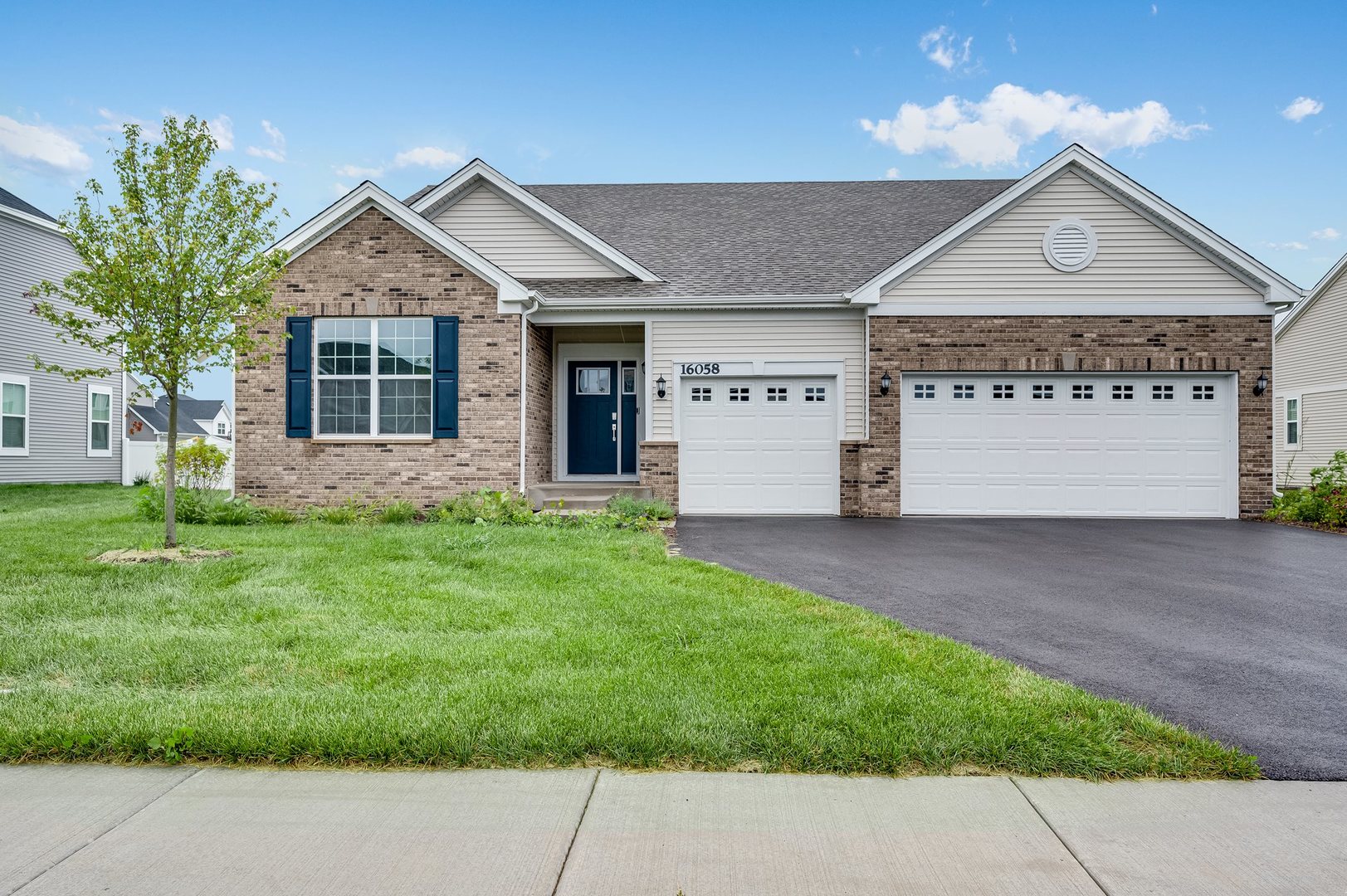 a view of a house with a yard