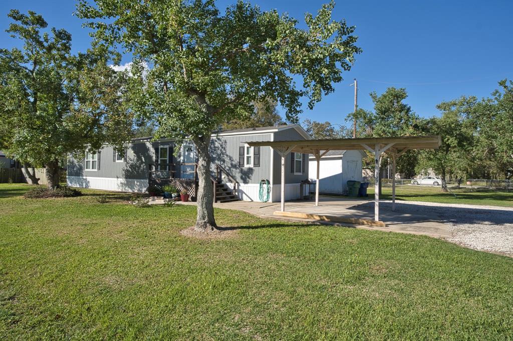 a house with trees in the background