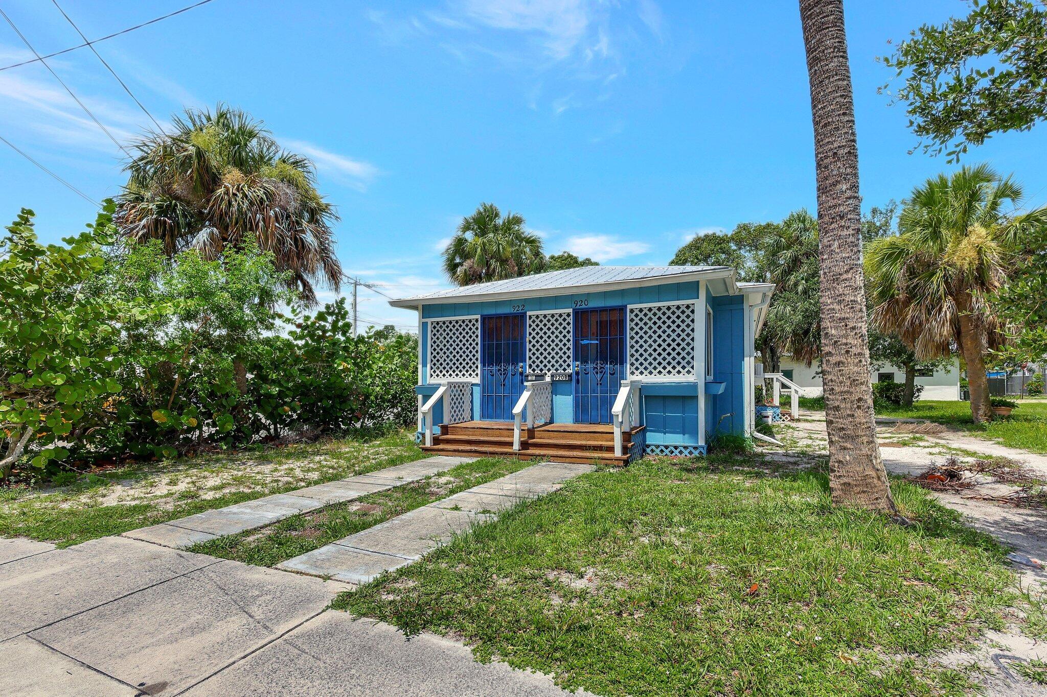 front view of a house with a yard