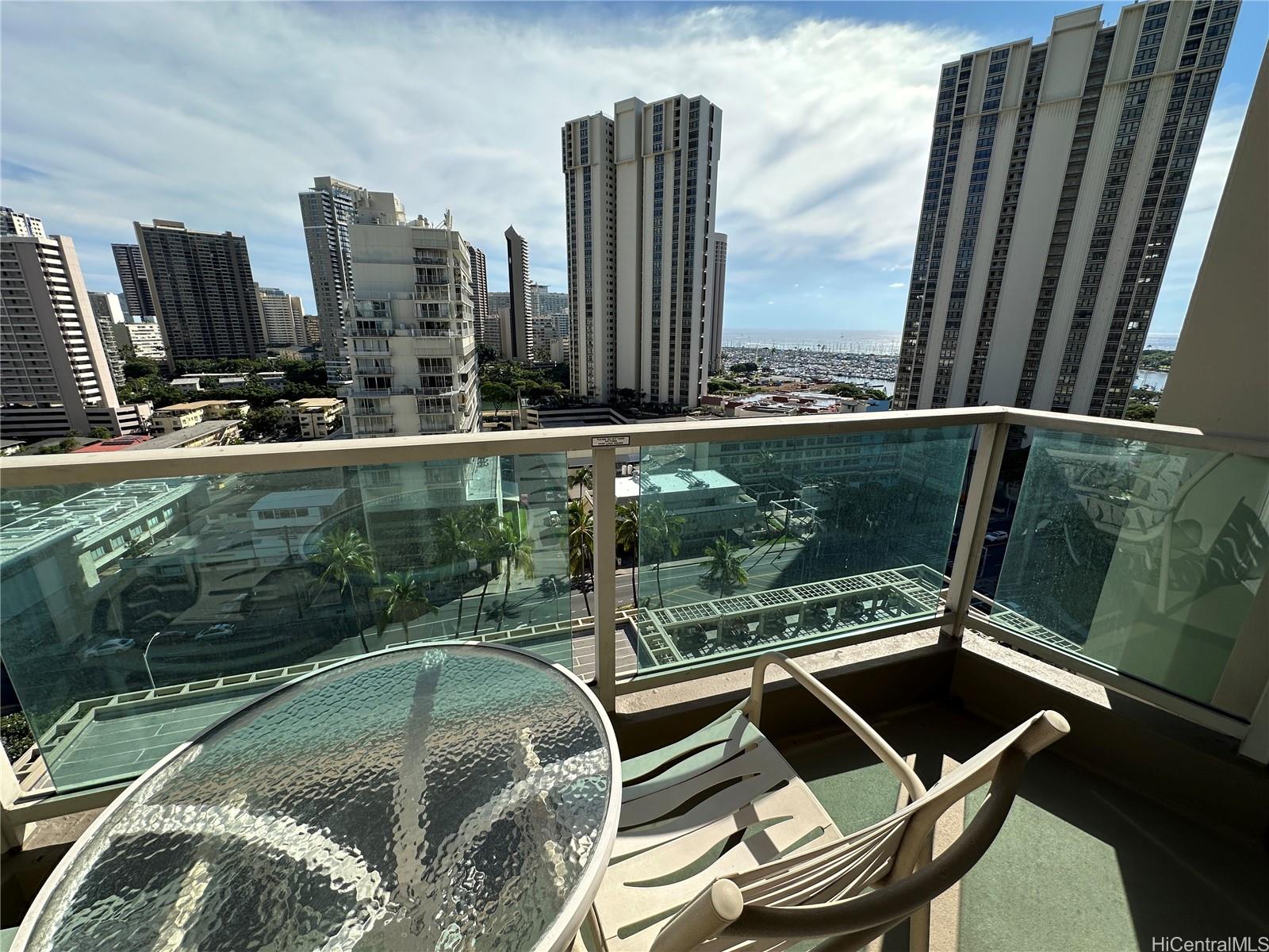 a view of a balcony with chairs