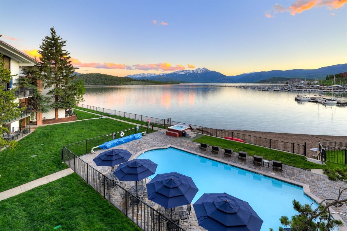 a view of a lake with a building in the background