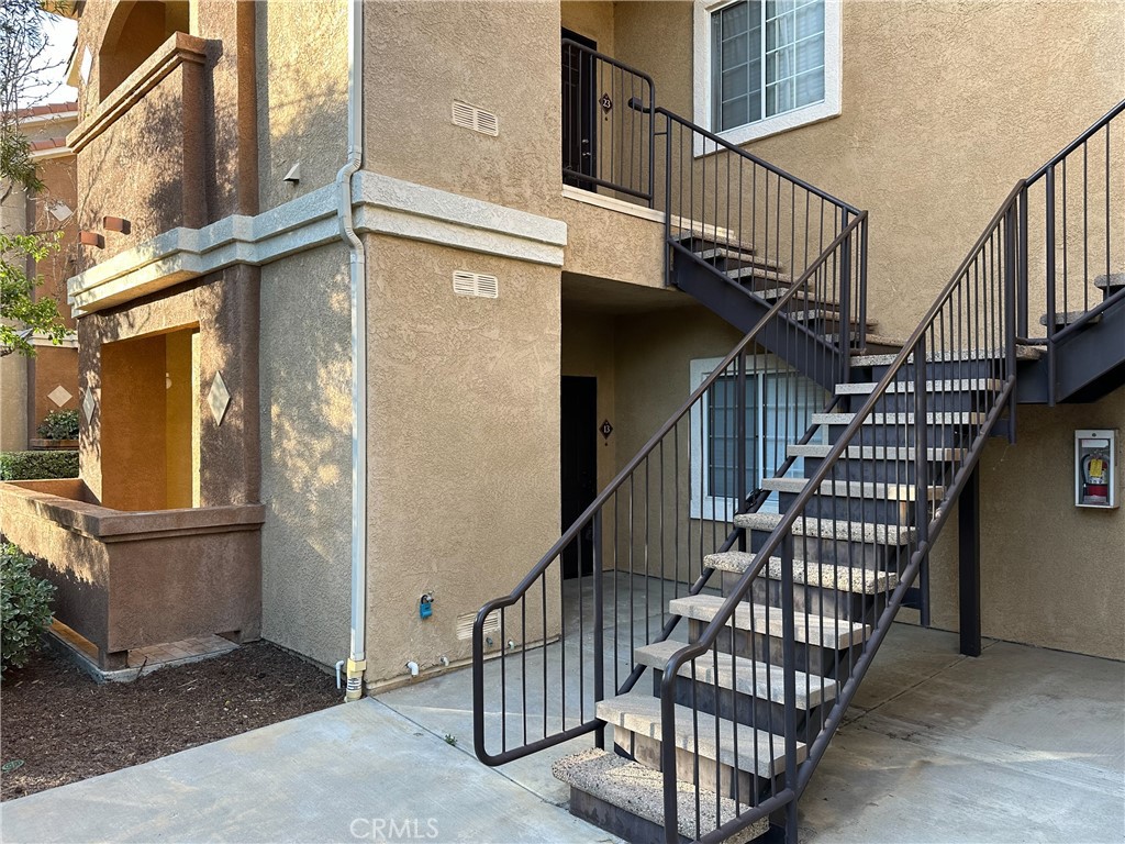 a view of entryway with a front door