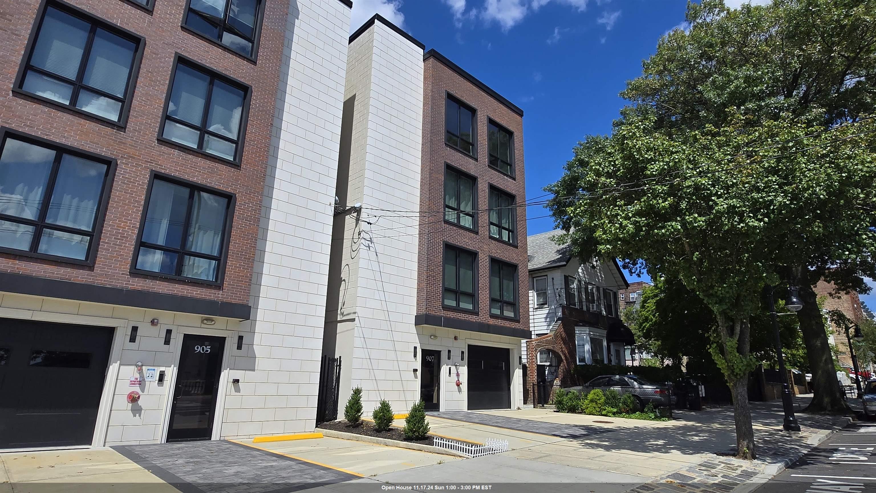 a front view of a multi story residential apartment building