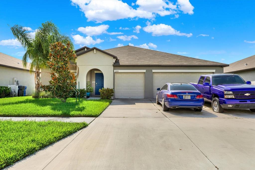 a house view with a garden space