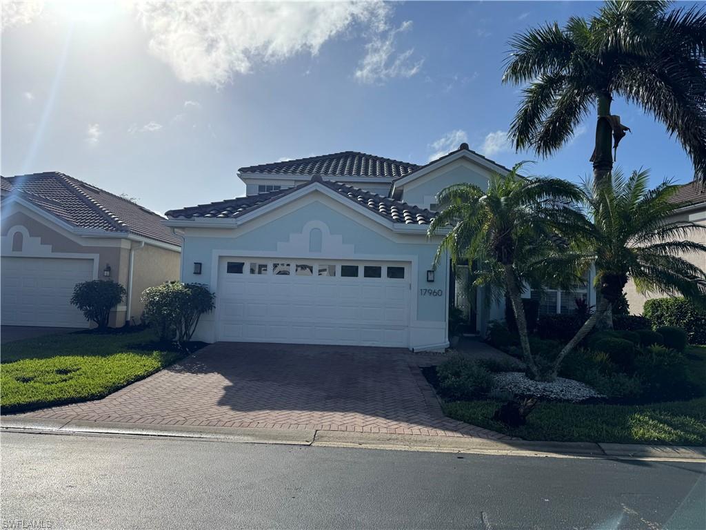 View of front of home featuring a garage