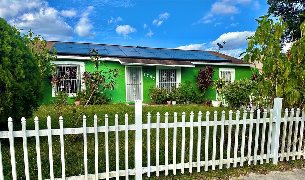 a house view with a garden space