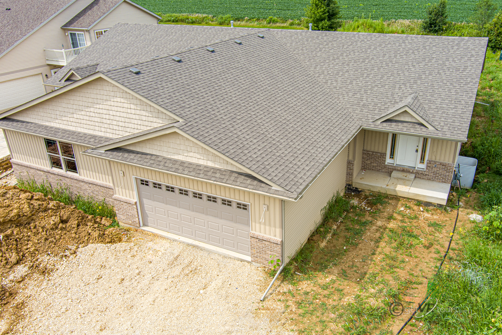 front view of a house with a yard