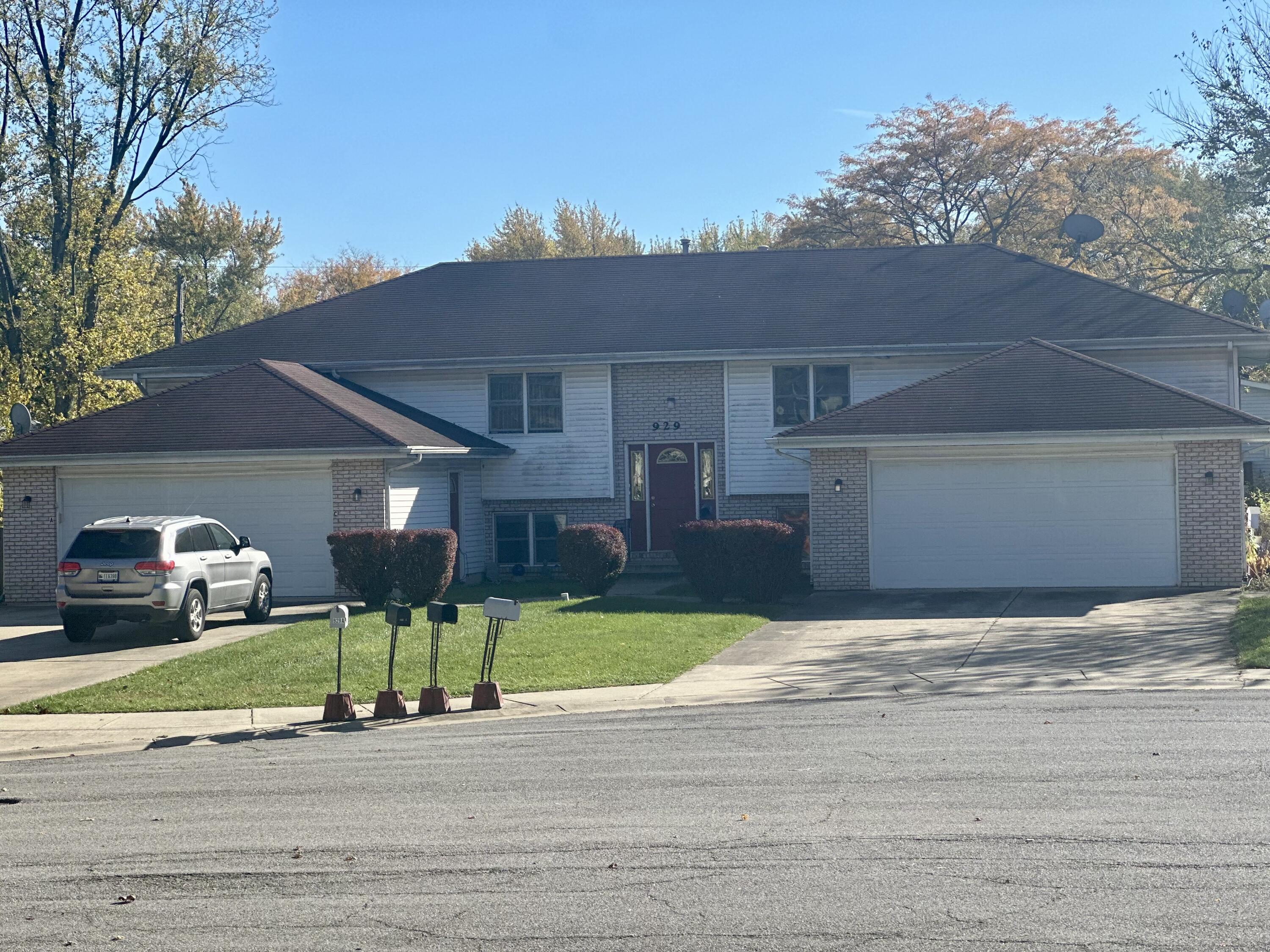 a house that has a lot of couches in front of it