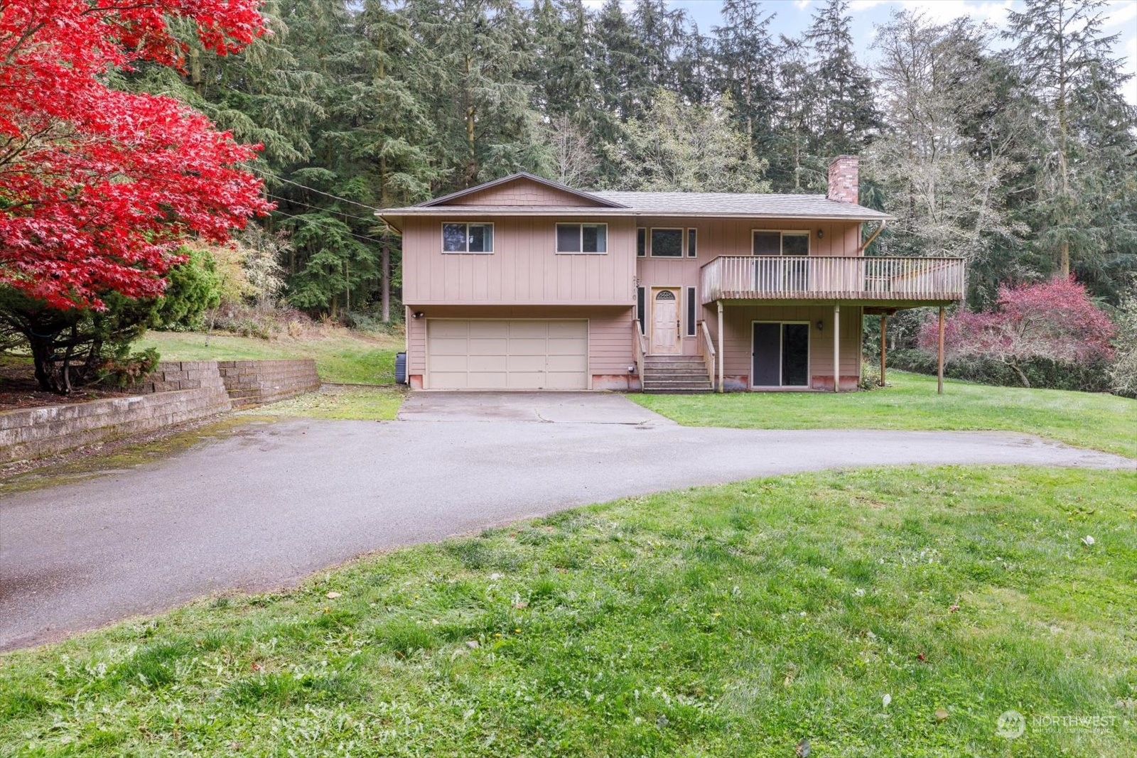 a view of house with outdoor space and pathway