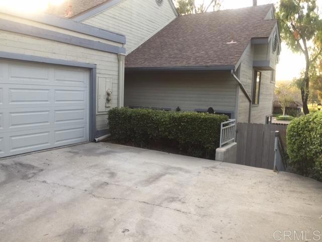 a view of backyard of garage