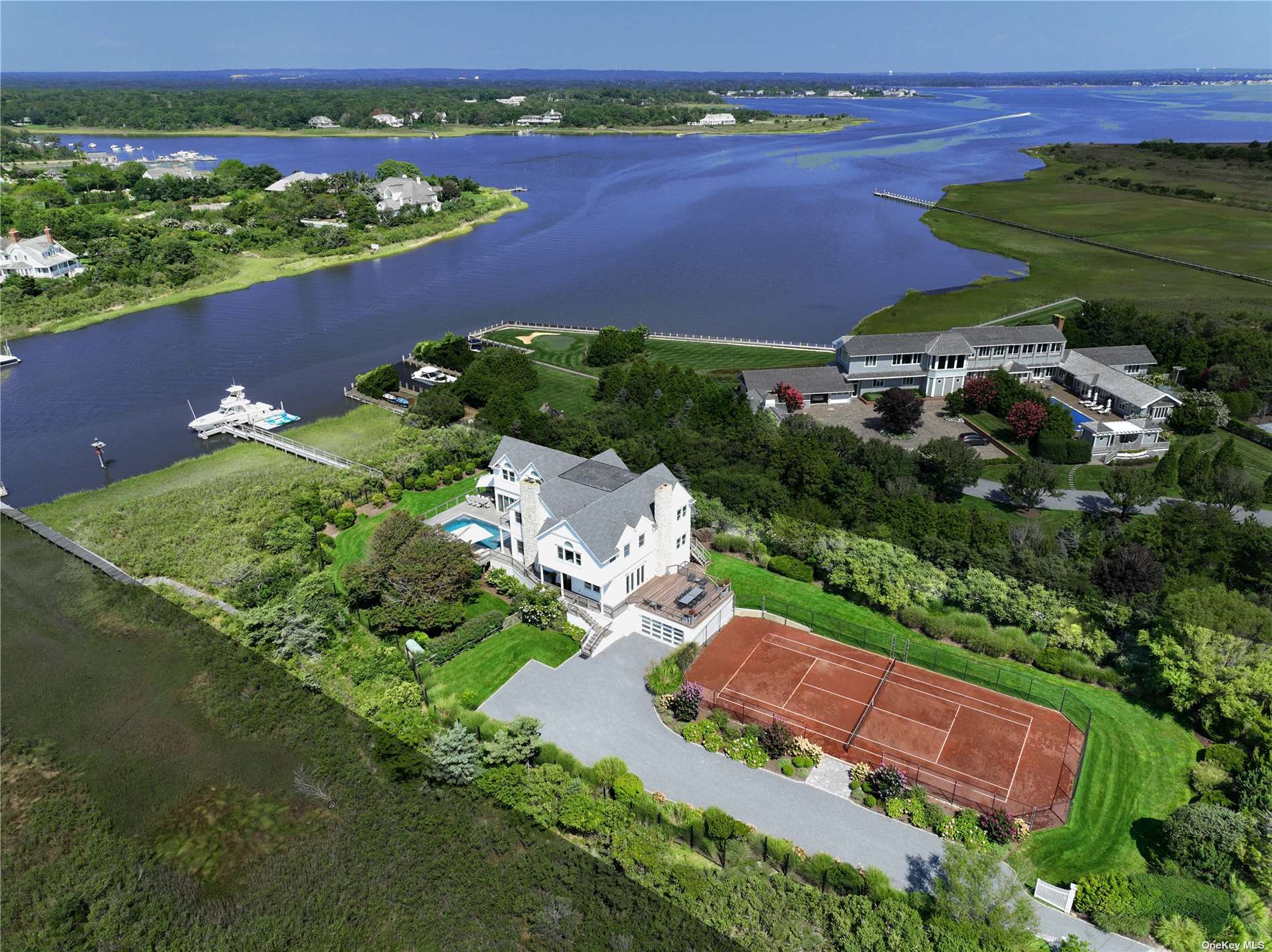 an aerial view of a house with a lake view