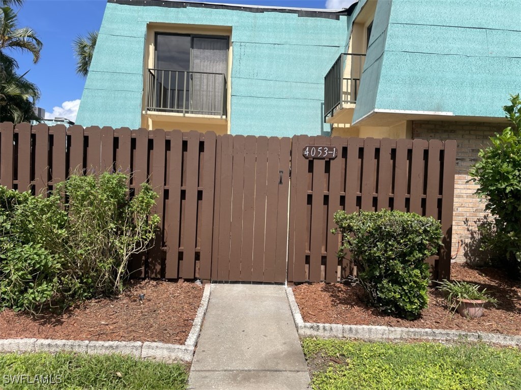 a view of a house with a garden