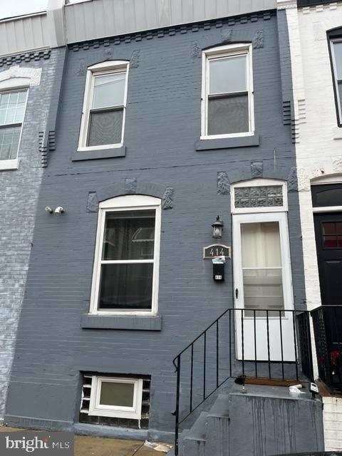 a front view of a house with a window