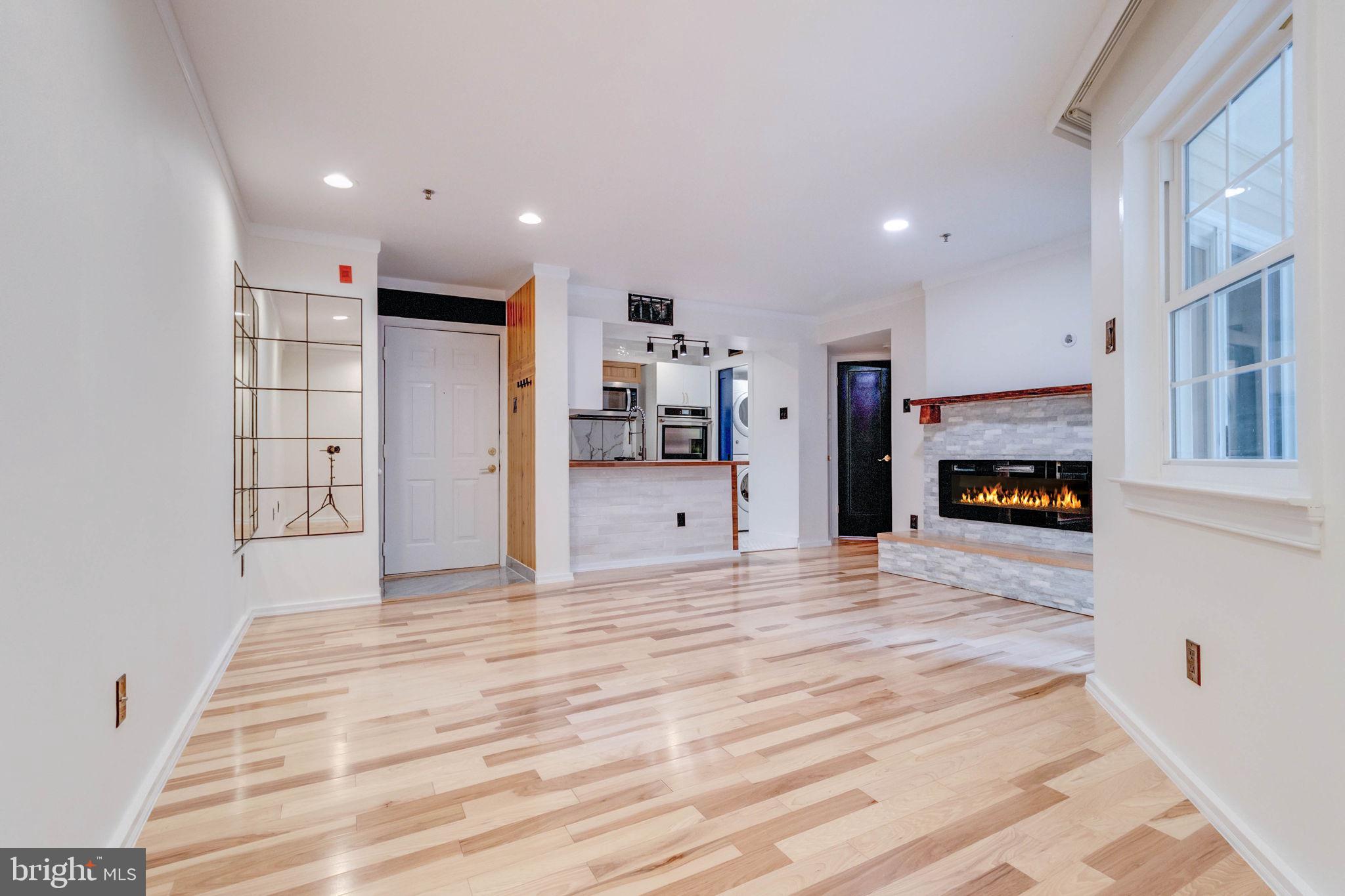 a view of a livingroom with a fireplace