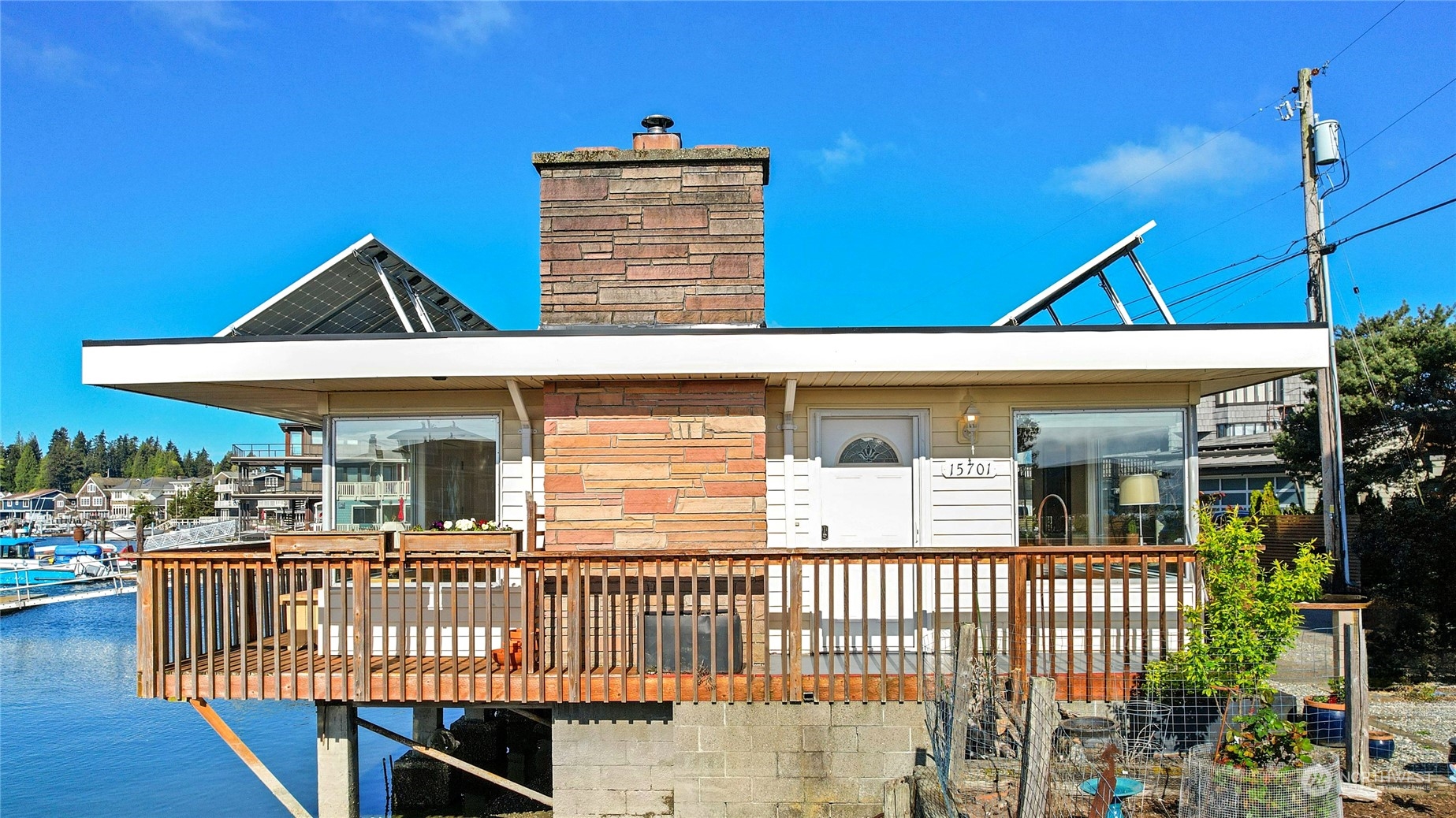 a front view of a house with deck