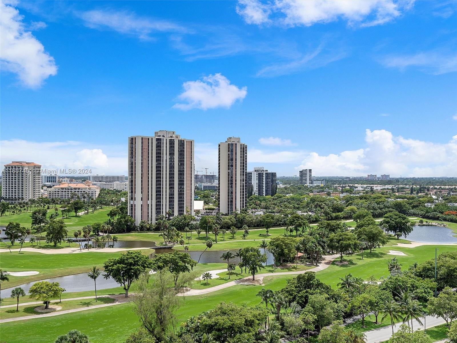 a view of a city with tall buildings