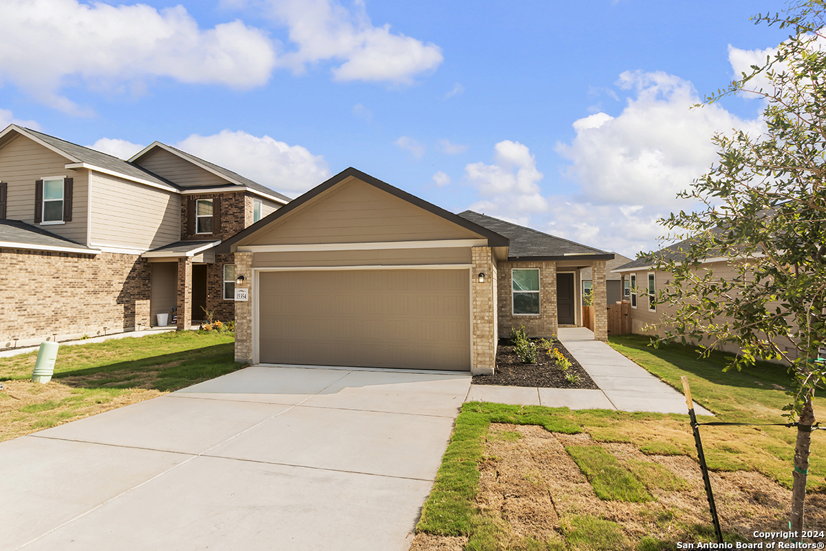 a front view of house with yard